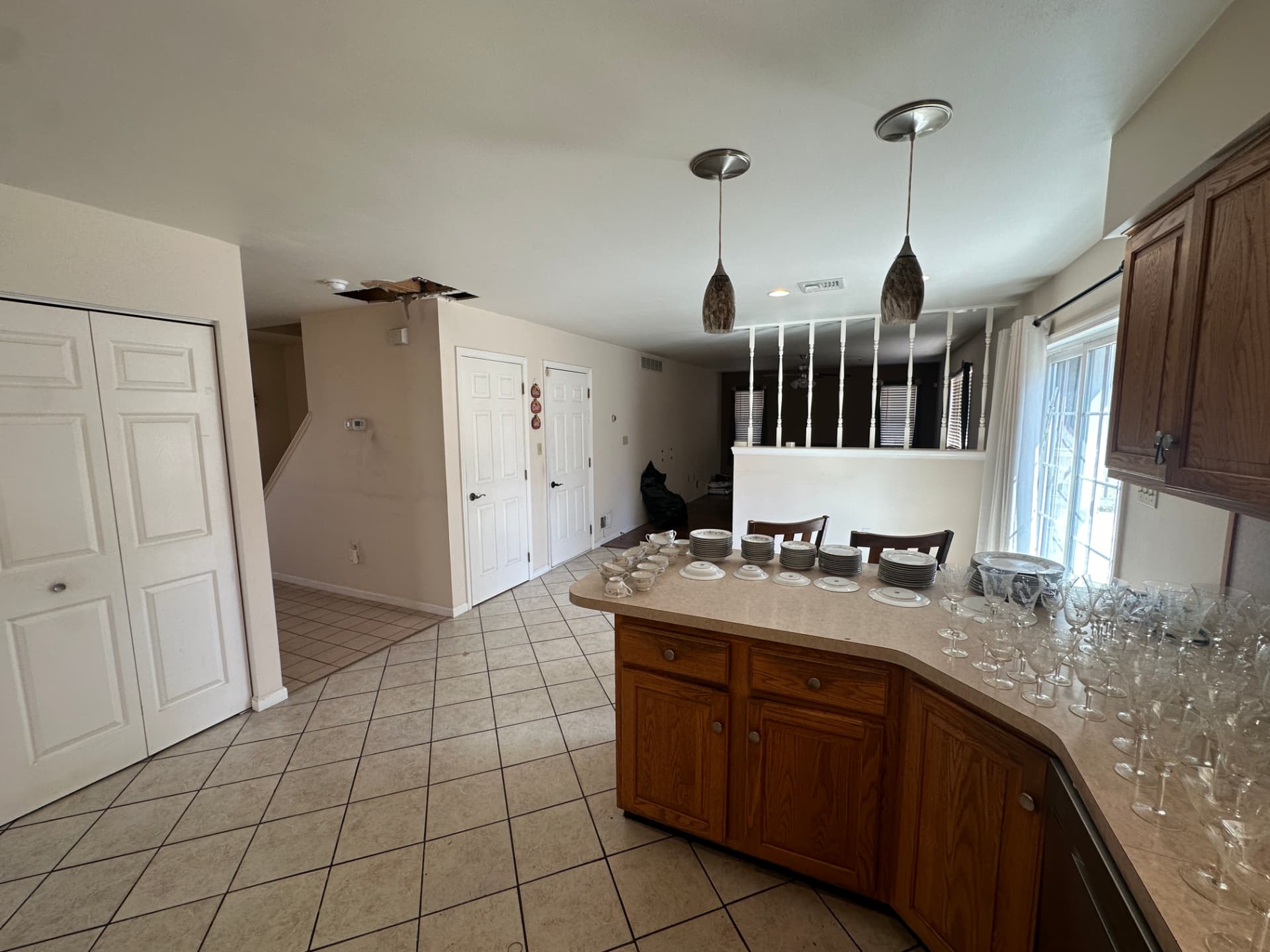 Kitchen island and open pass through toward the living area